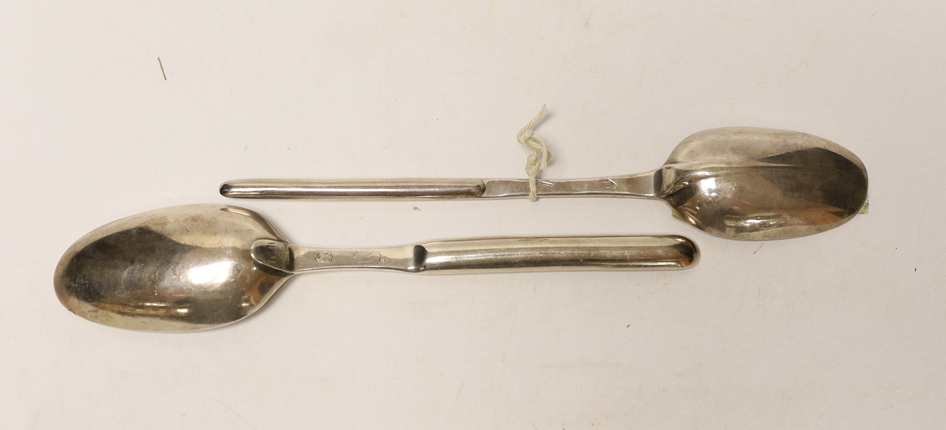 Two mid 18th century Irish silver combination marrow scoop spoons, marks rubbed, longest 22.8cm, 126 grams.